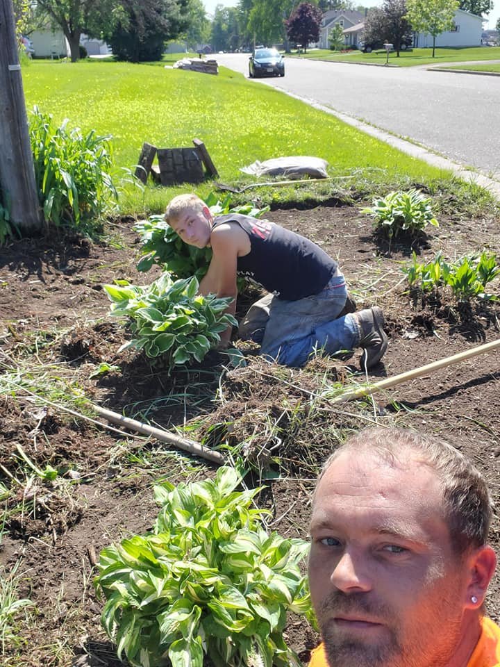 Fresh mulch and plant install by Garbers & Sons Eau Claire WI